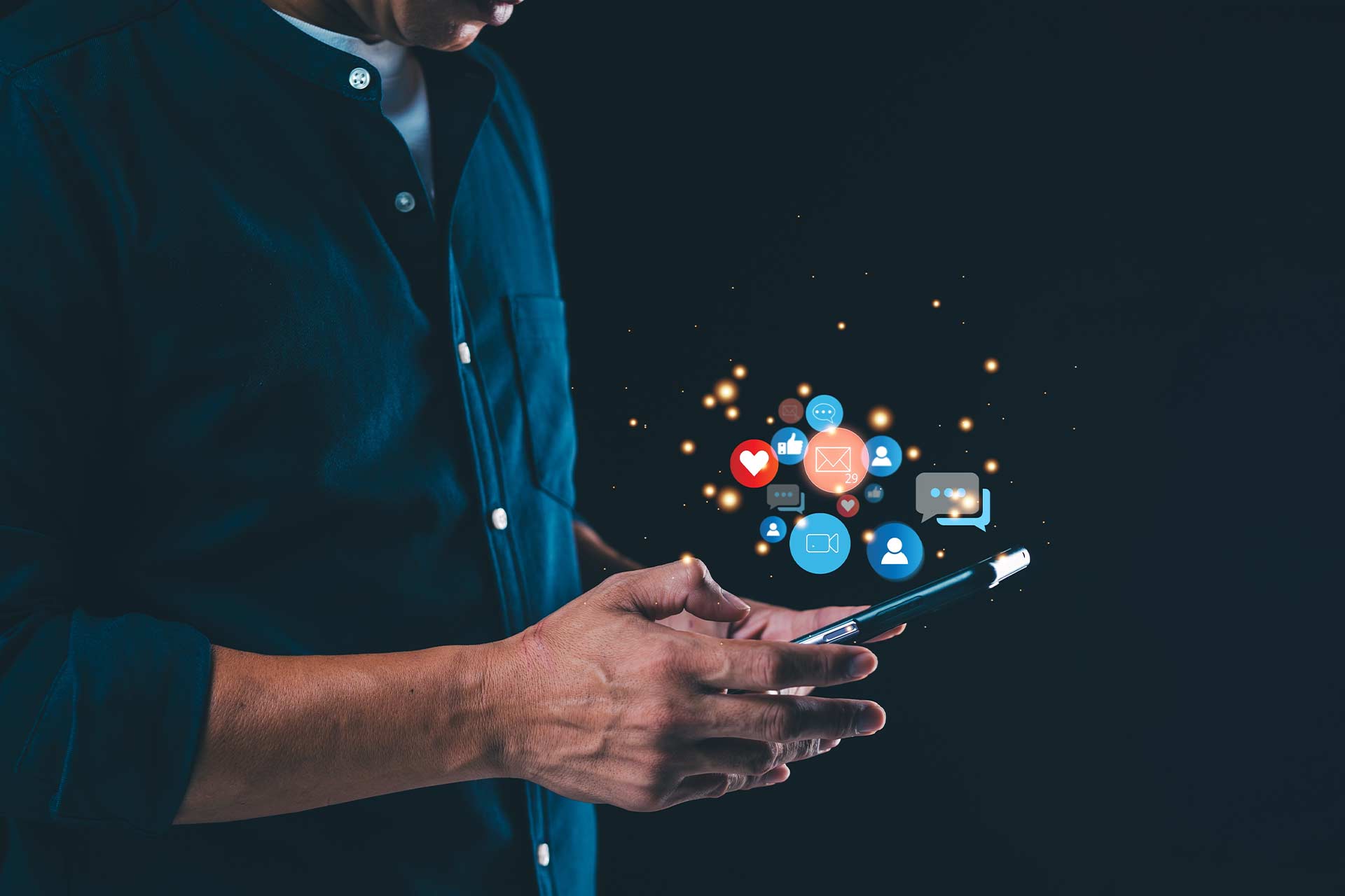 A person uses a smartphone, reviewing social media profile audit icons above.
