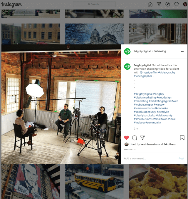 People filming an interview with lights, cameras, and Instagram for business.