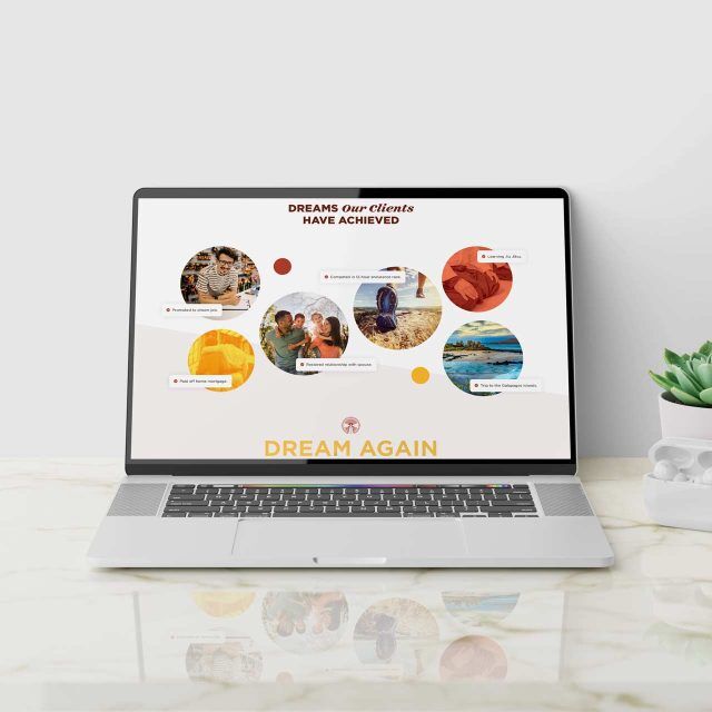 Laptop on marble table displaying a presentation with images and text.