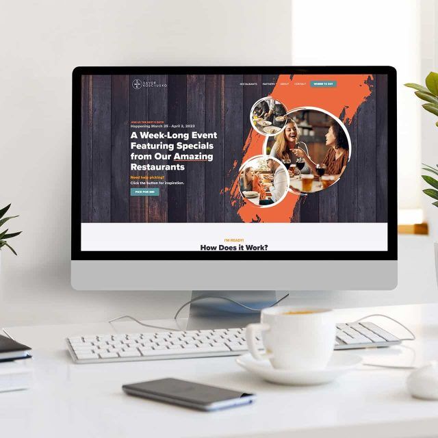 Computer screen displaying a website about restaurant event specials.