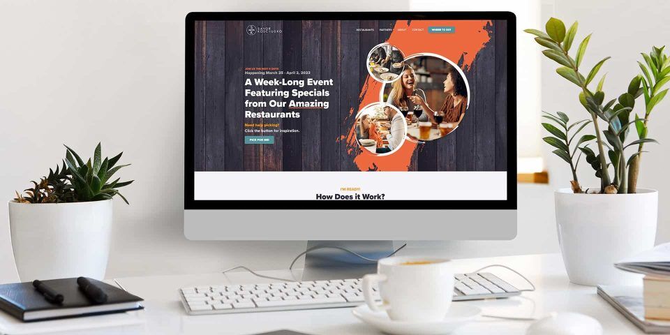 Computer screen displaying a website about restaurant event specials.