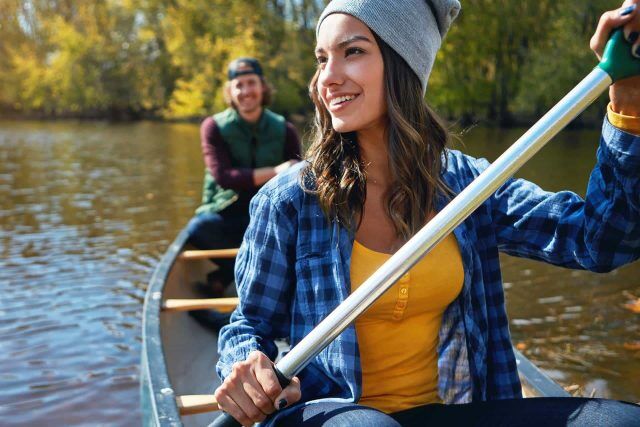 Two on a canoe, embracing the calm of Tippy River adventures.