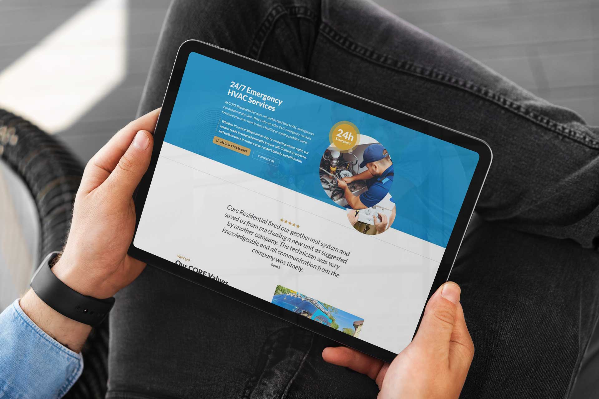 Person holding tablet displaying CORE Residential HVAC service webpage.