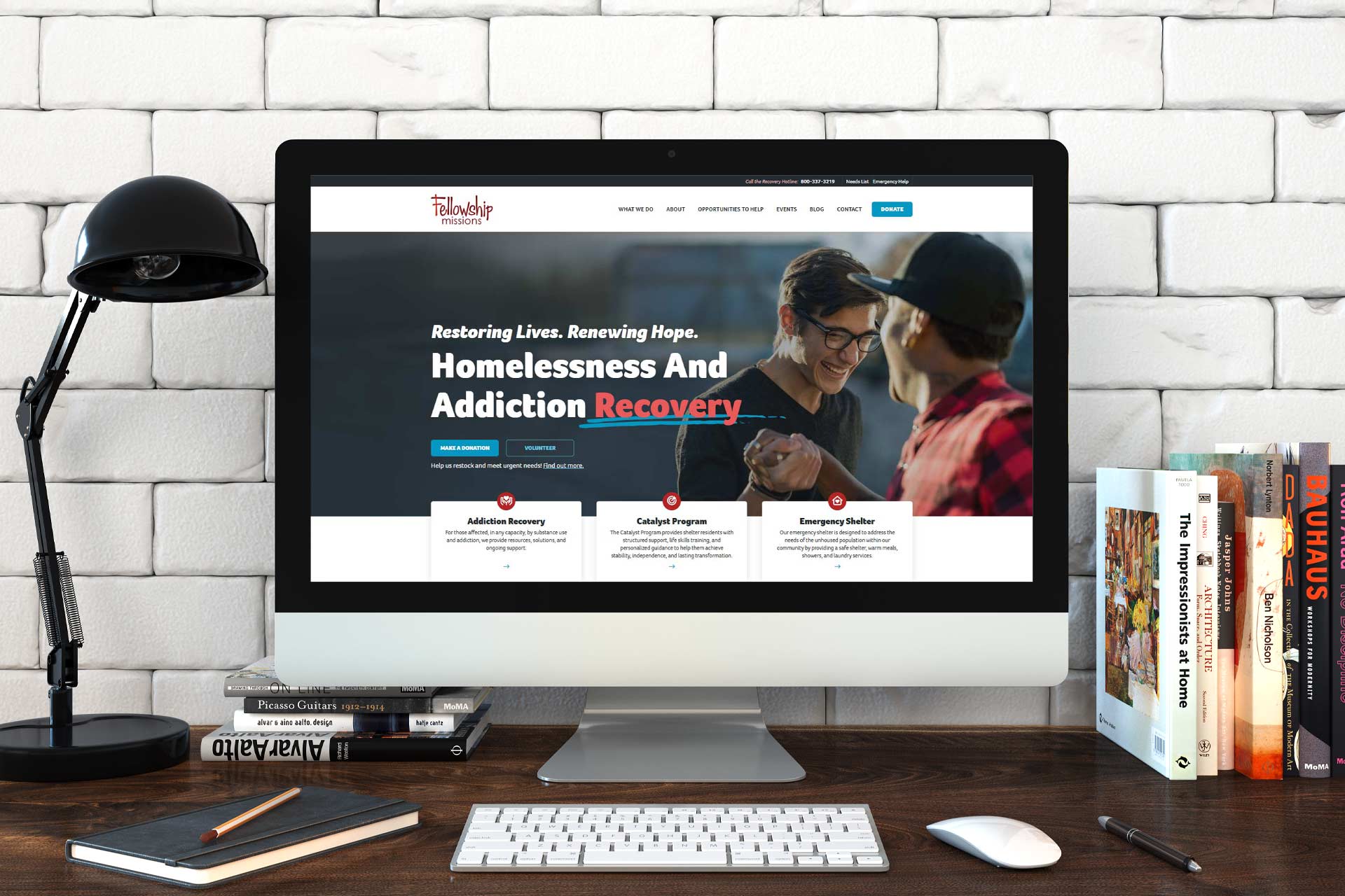 Computer on a desk displaying the Fellowship Missions recovery website.