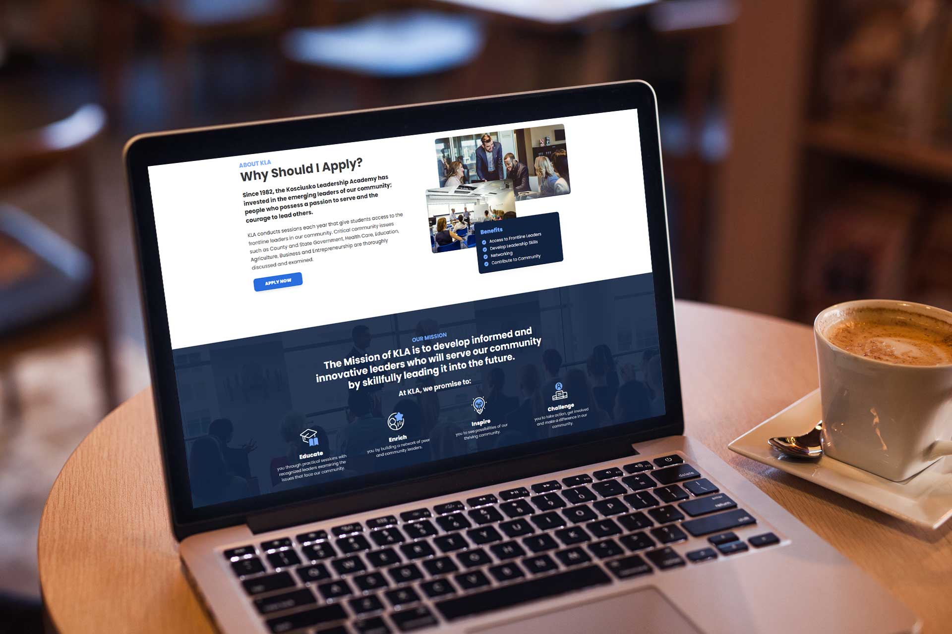 Laptop on a table displaying Kosciusko Leadership Academy website.