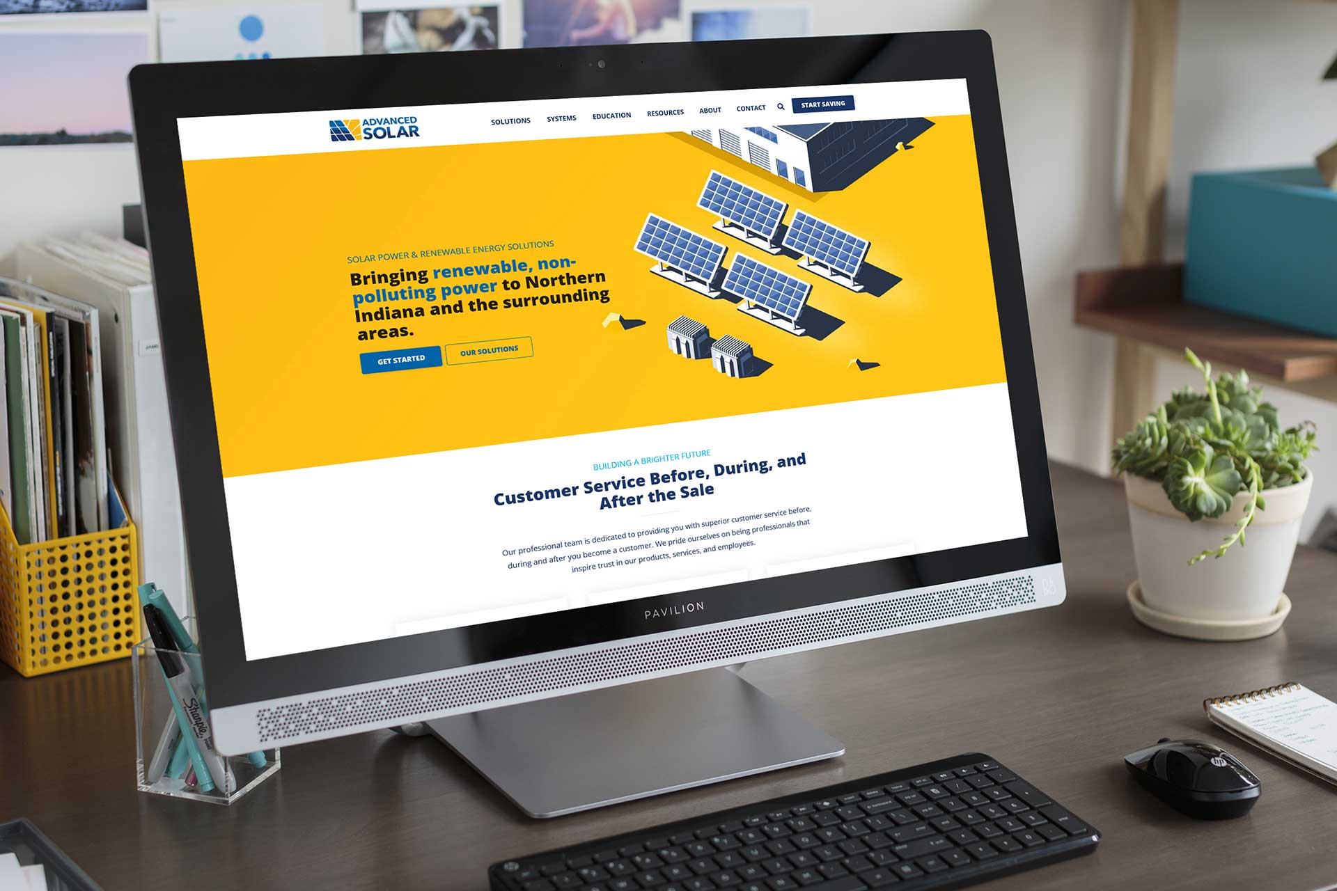 Computer screen showing Advanced Solars website for solar energy solutions.