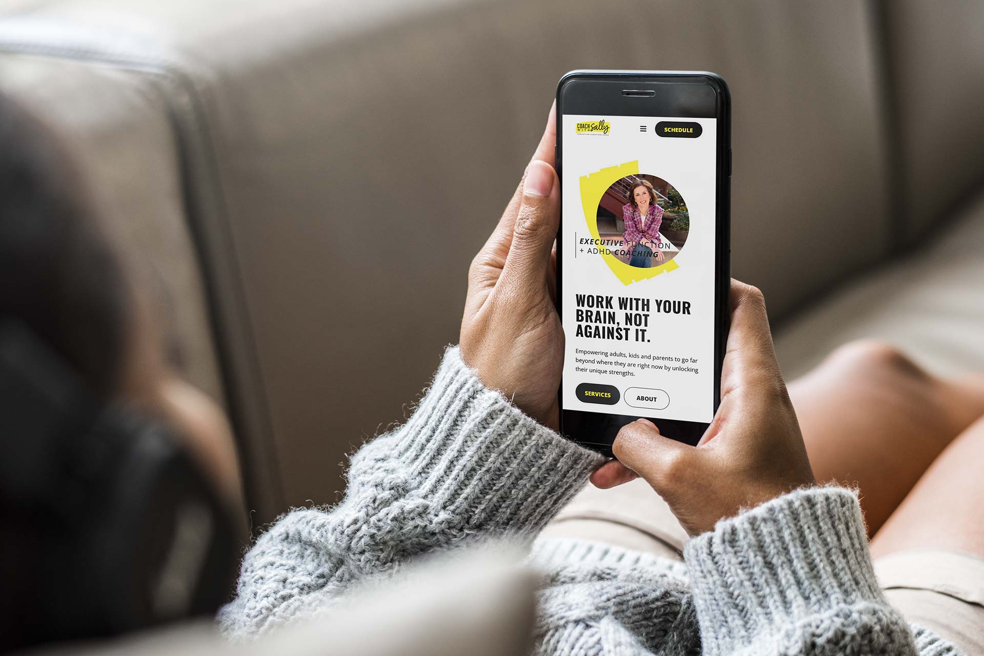 Relaxing, browsing Coach With Sallys site on a smartphone.