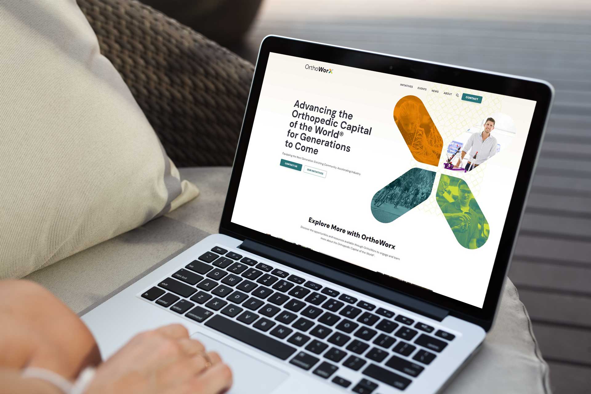 Person browsing OrthoWorx on a laptop, exploring the homepage.