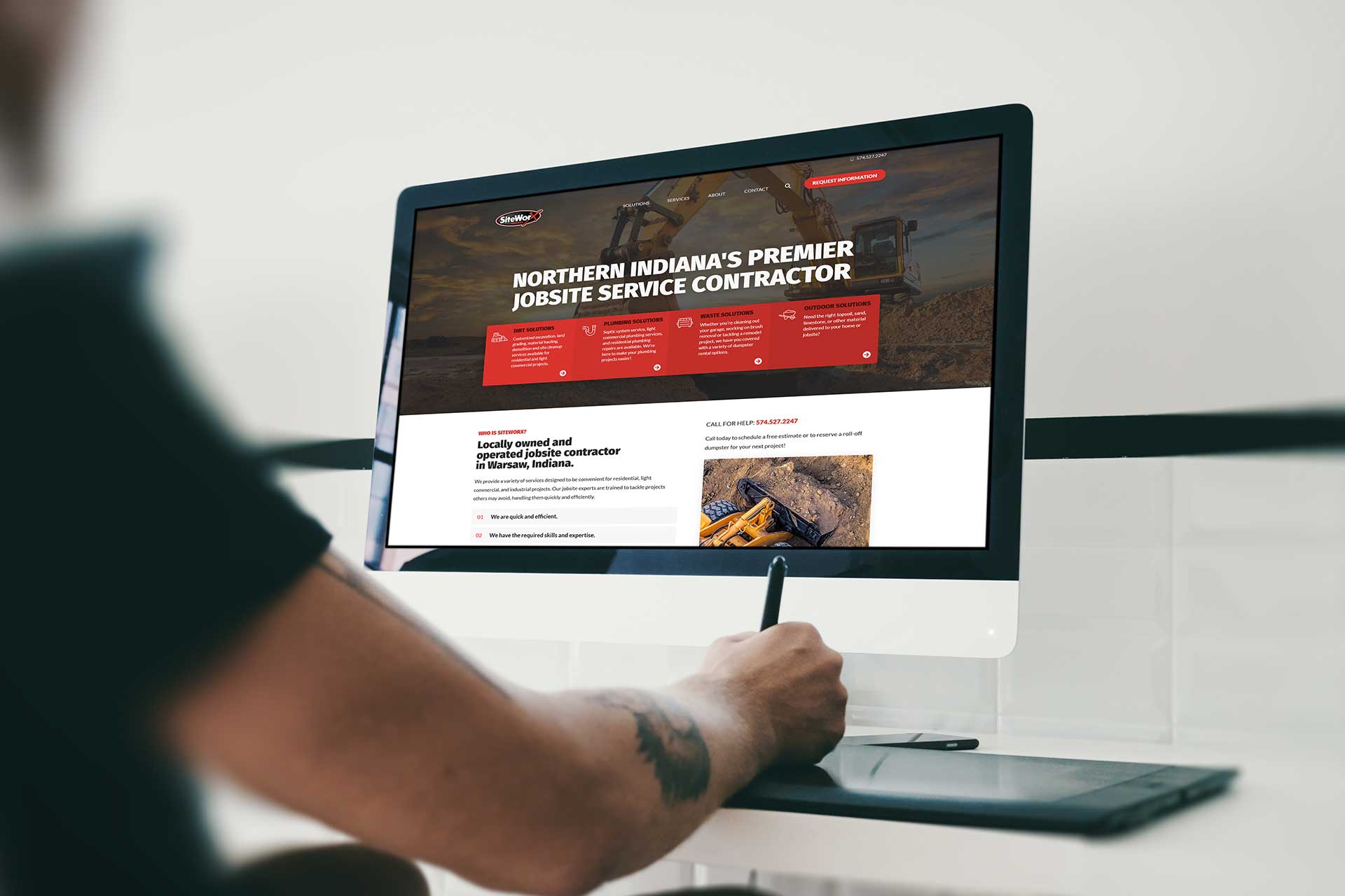 Person viewing SiteWorx Services on their computer screen.