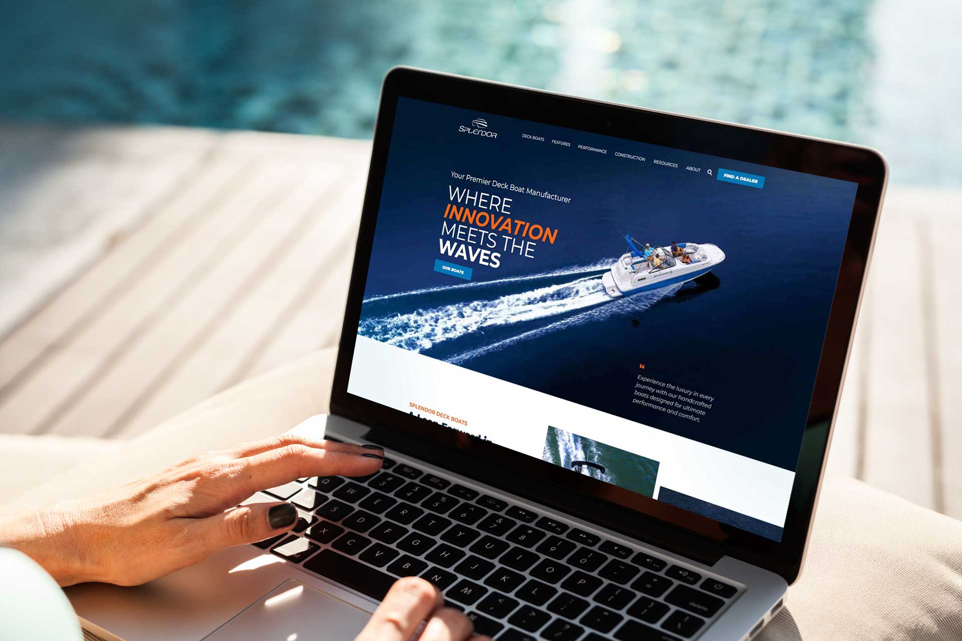 A Splendor Boats website is displayed on a laptop near the pool.